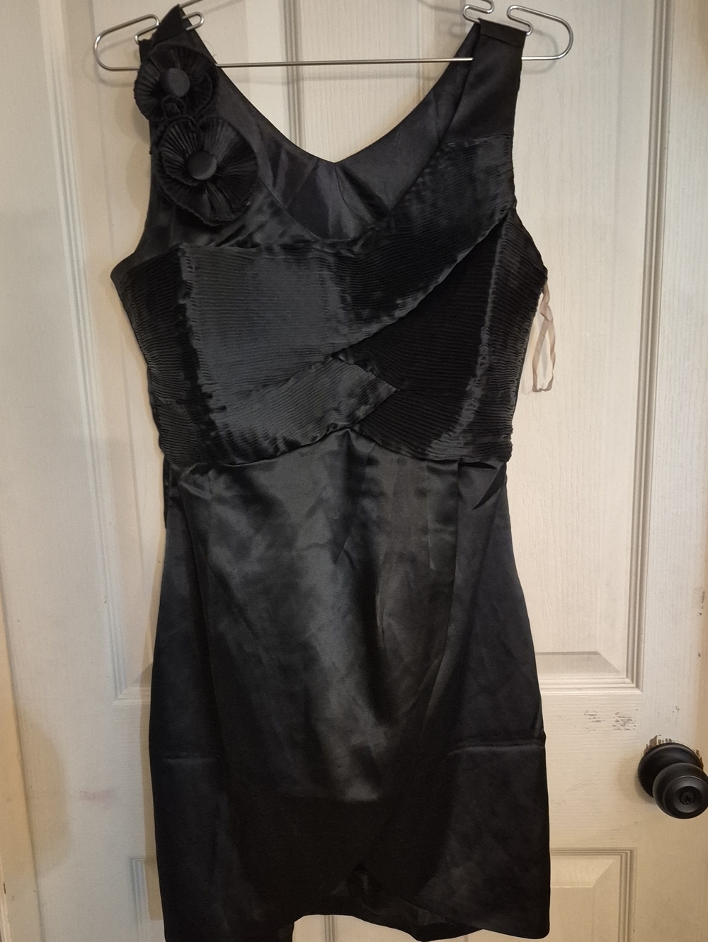 Black Sleeveless Cocktail Dress with Floral Accent